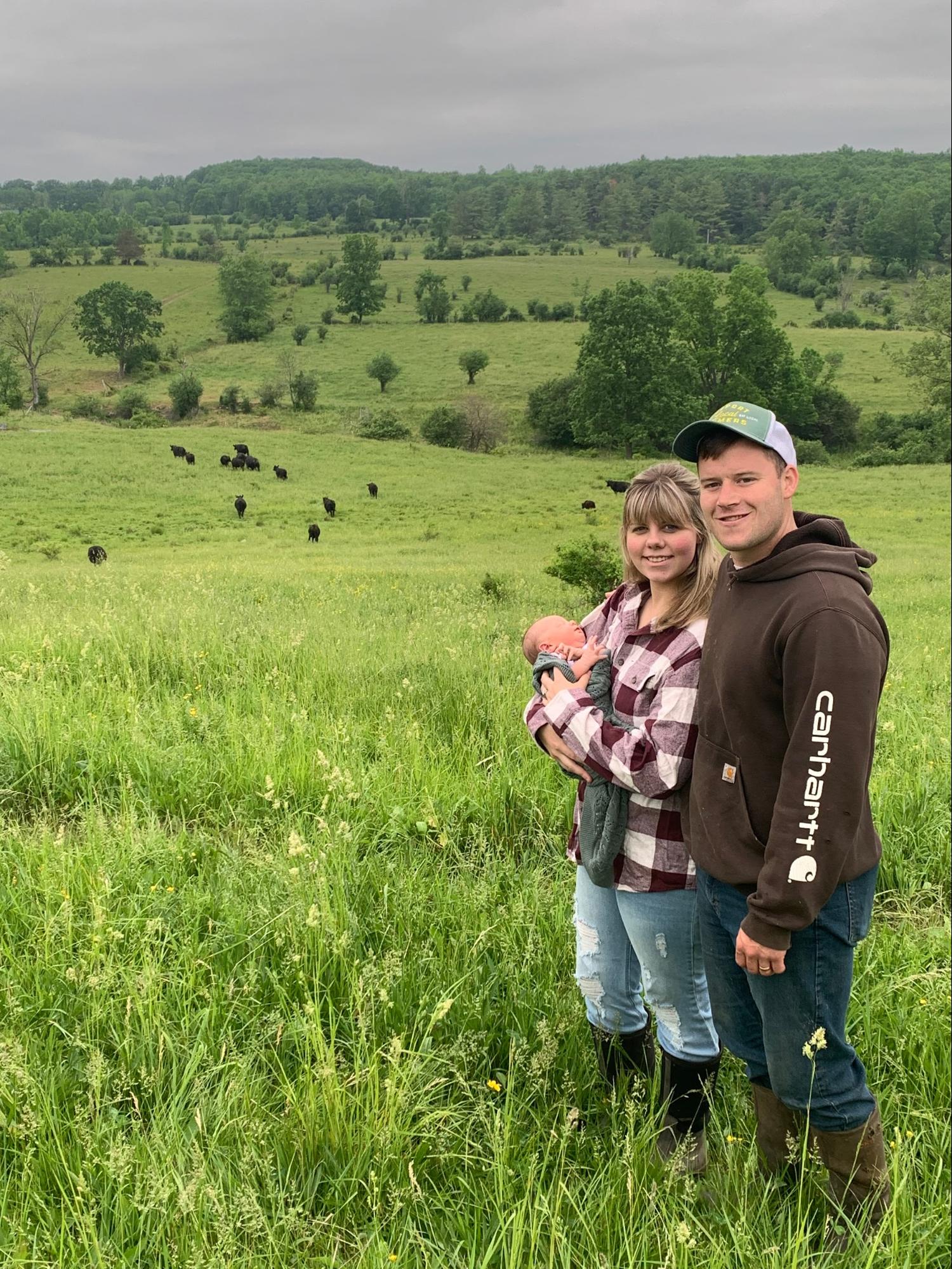 VanDerwerken Family overlooking cattle